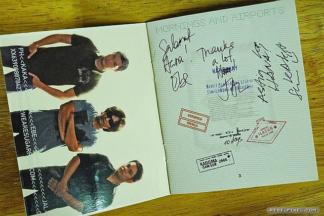 Our signed passport-inspired CD insert.